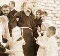 St Padre Pio with children