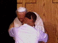 John Paul II embracing young man