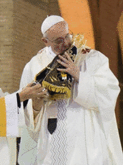 Pope Francis embracing Our Lady of Aparecida
