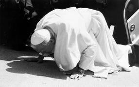 St John Paul II kissing Korean soil on his arrival in Korea in May 1984
